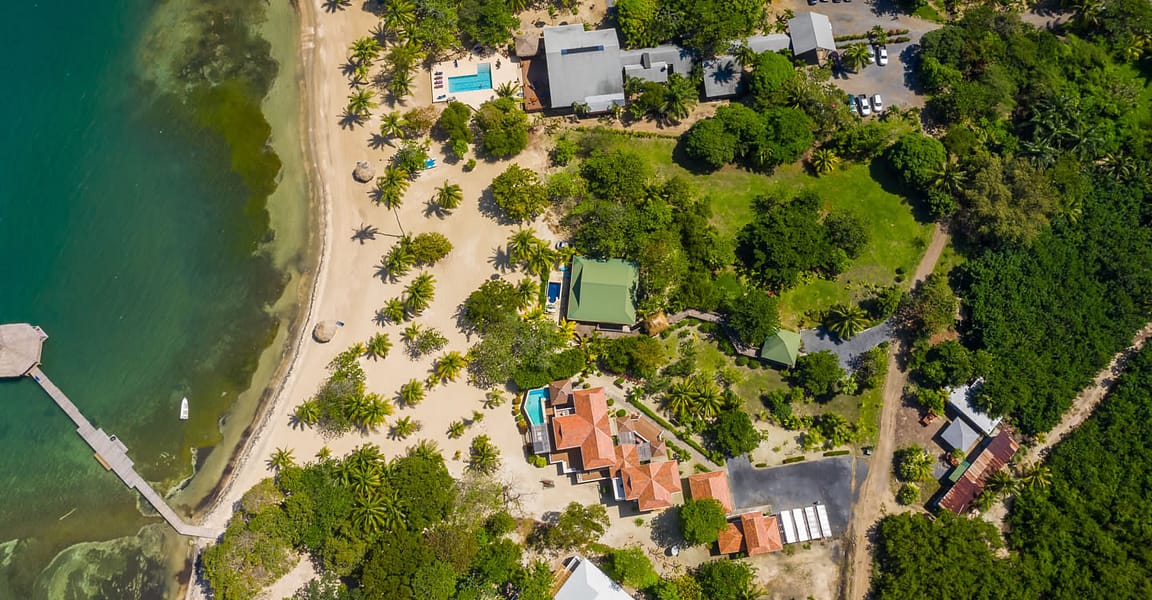 0.56 Acres of Beachfront Land for Sale, Palmetto Bay, Roatan 7th