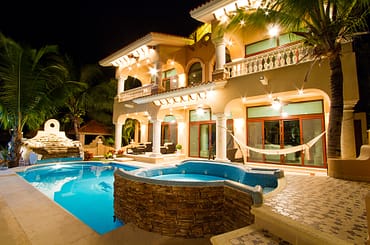 Luxury house for sale, Puerto Aventuras, Riviera Maya, Mexico - pool & house at night