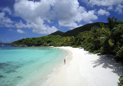 Woman on the beach at Denis Bay, St John in the US Virgin Islands