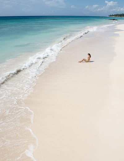 Aerial view of woman on the beach in Barbados