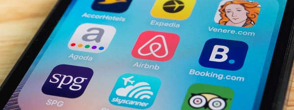 Airbnb's website and mobile app - making it easy for travelers to book accommodation and for home owners to make extra money