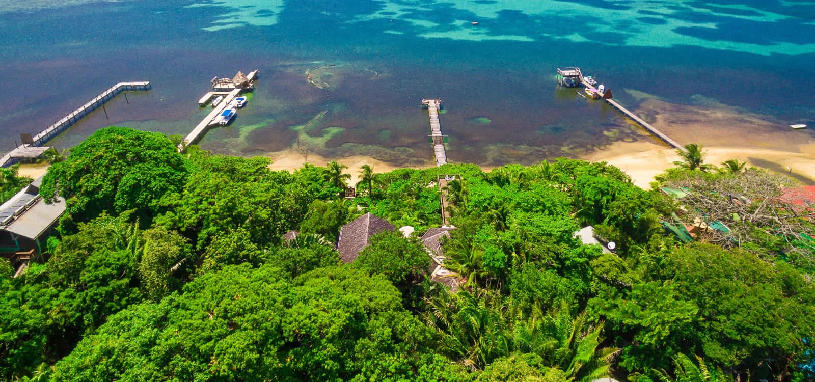 Boutique Hotel for Sale, Sandy Bay, Roatan - 7th Heaven Properties