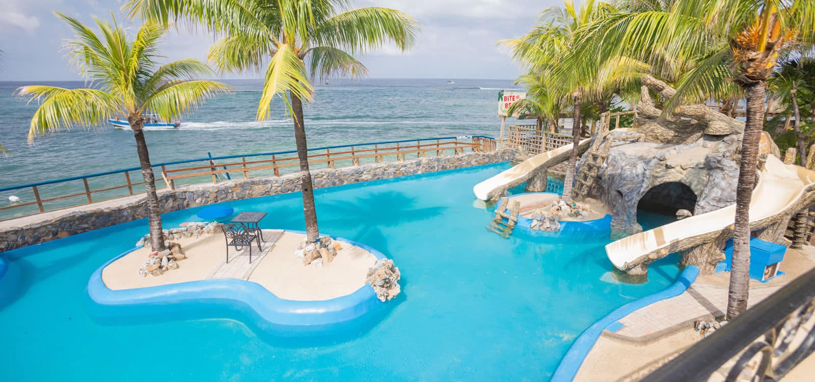 6 Bed Waterfront Bed & Breakfast for Sale, West Bay, Roatan 7th Heaven Properties